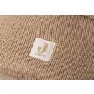 Jollein Sprinkle Knit pelenkatároló kötött anyagának és varrott márkajelzésének közeli képe