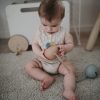 Mushie cumitartó - bézs