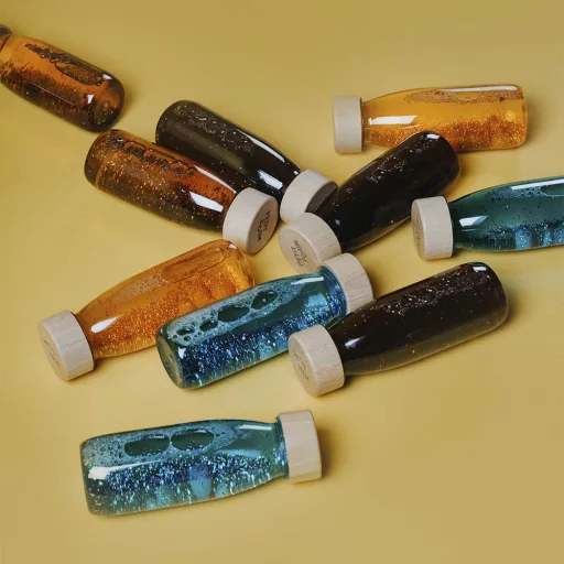Petit Boum szenzoros játék - Float bottle - Cúrcuma