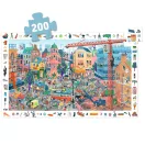 A kirakott Djeco városi megfigyelő puzzle és a fehér kereten található keresendő tárgyak