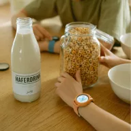 Kidywolf K-WATCH interaktív korall színű gyerekóra színes OLED kijelzővel és szőtt pánttal