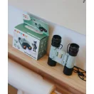 A zöld Kidywolf Kidybinoculars távcső és a doboza a polcon